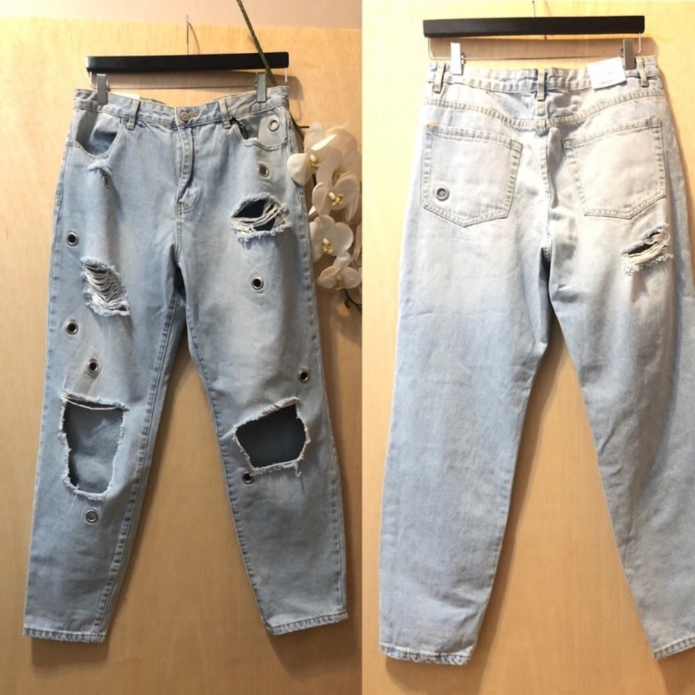 Distressed high waisted busted knee grommet jeans